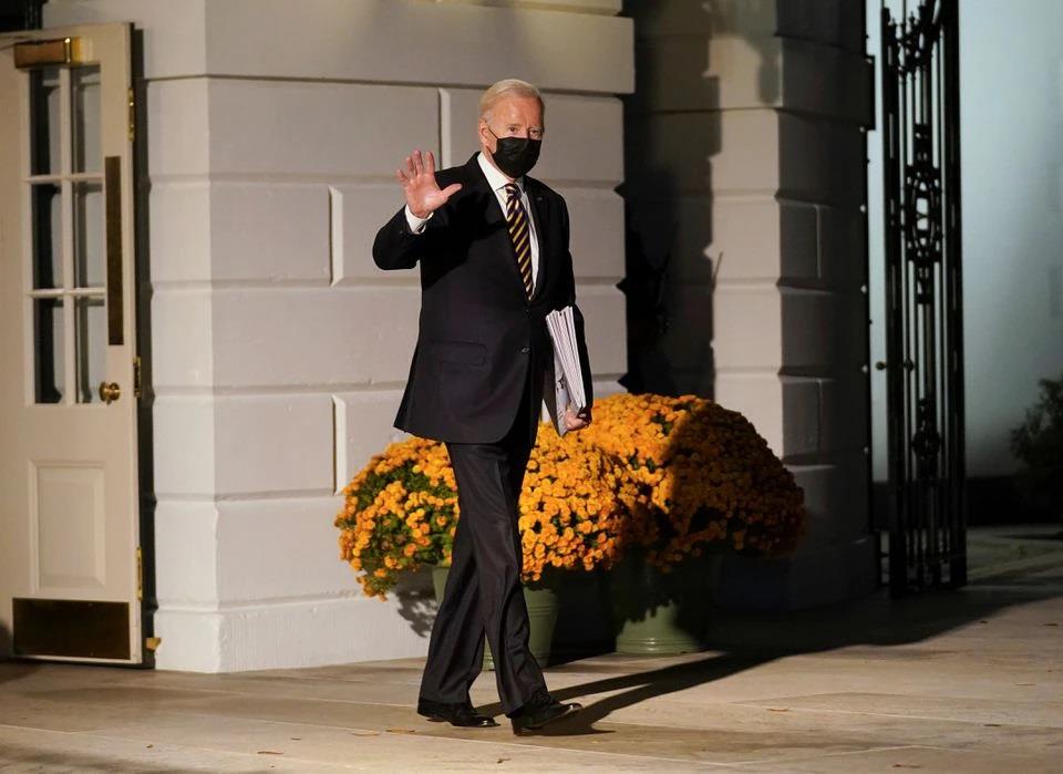 President Biden waves